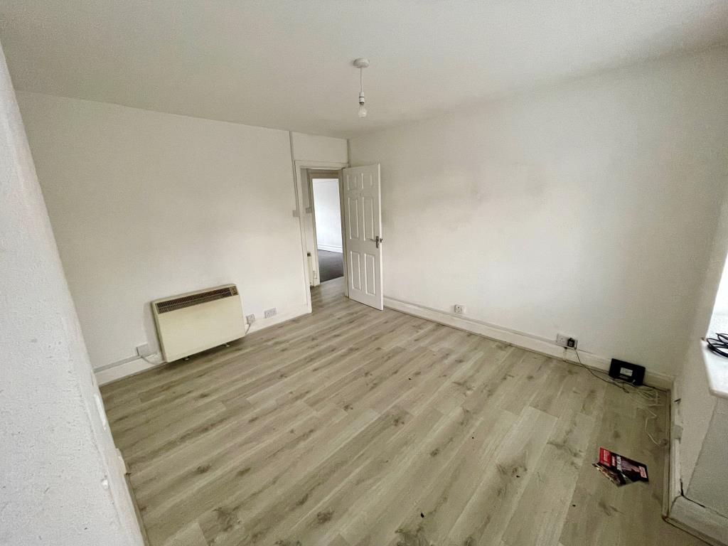 Lot: 12 - VACANT TWO-BEDROOM FLAT - Living room